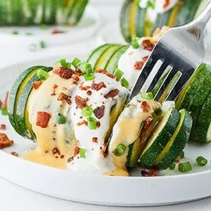 Savory Keto Snack Loaded Hasselback Zucchini